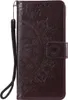 A brown leather flip case for a Samsung Galaxy A20e with a mandala embossed pattern. Produktbild-Vorschau