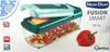 The image shows the packaging of a Nicer Dicer Fusion Smart kitchen system, with the product itself and chopped vegetables visible. Produktbild-Vorschau