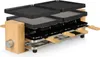 A multi-level raclette grill with a bamboo frame, shown from a diagonal angle against a white background. Produktbild-Vorschau