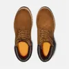 A top-down view of a pair of brown Timberland boots. Anteprima dell’immagine prodotto