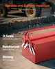A red metal toolbox is shown in a construction or industrial setting, with text highlighting its durability and features. Podgląd zdjęcia produktu