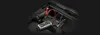 A jump starter is shown connected to a car battery. Podgląd zdjęcia produktu