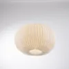 A white, pleated pendant light hangs from a thin cord against a white background. Produktbild-Vorschau
