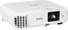 A white Epson projector is shown from a slight diagonal angle against a white background. Voir les images du produit