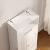 A white bathroom cabinet with an open shelf, a drawer, and two doors, shown from a diagonal top-down angle. Náhled obrázku produktu