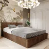 A bedroom with a bed, wardrobe, and decorative wallpaper.