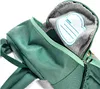 A close-up view of the inside of a green backpack, showing a name tag. Podgląd zdjęcia produktu