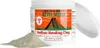 A jar of Aztec Secret Indian Healing Clay with some powder spilled in front of it, against a white background. Náhľad obrázku produktu