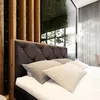 A bedroom scene with a bed. Produktbild-Vorschau
