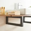 A bathroom shelf with toiletries and towels, next to a sink. Anteprima dell’immagine prodotto