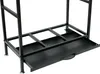 A close-up view of the lower section of a black metal firewood rack, showing a pull-out drawer. Podgląd zdjęcia produktu