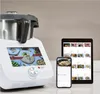 A kitchen appliance with a touchscreen display, alongside a tablet and smartphone, all showing food-related content. Náhled obrázku produktu