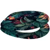 A toilet seat with a tropical bird and leaf pattern. Náhled obrázku produktu
