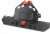 A black tile cutting accessory with red adjustment knobs, shown against a white background. Náhled obrázku produktu