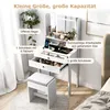 A white vanity table with a mirror, drawers, and a stool, set up in a room with curtains and a bed in the background. The image highlights the product's features with text overlays. Podgląd zdjęcia produktu