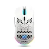 A white gaming mouse with honeycomb cutouts and RGB lighting is shown against a white background. Produktbild-Vorschau