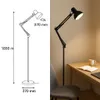A diagram and a photograph of a black floor lamp next to a desk with a chair. Náhľad obrázku produktu