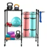 A black metal storage rack filled with various fitness equipment, including kettlebells, dumbbells, yoga mats, and a stability ball. Náhled obrázku produktu