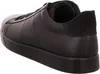 A black leather sneaker shown from the side. Voir les images du produit