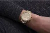 A close-up shot of a gold watch with rhinestones on a person's wrist. Náhľad obrázku produktu
