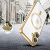 A gold and clear iPhone case with MagSafe is shown at an angle on a street. Podgląd zdjęcia produktu
