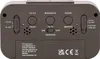 The back of a digital alarm clock with various buttons and labels. Anteprima dell’immagine prodotto