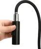 A hand holding a black pull-out spray head for a kitchen faucet. Náhled obrázku produktu