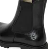 A close-up view of the side of a black leather boot. Produktbild-Vorschau