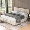 A bedroom scene featuring a bed with a headboard and storage, set against a large window with a view of greenery. Produktbild-Vorschau