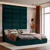 A bedroom with a large teal upholstered headboard and a bed with teal bedding. Anteprima dell’immagine prodotto