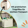 A garden storage box with its lid open, placed outdoors on grass, with gardening tools inside. The image also features text highlighting its practical handles for easy transport. Produktbild-Vorschau