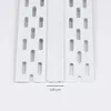 Close-up of a white plastic profile with holes, possibly for construction or organization, with a measurement indicator. Produktbild-Vorschau