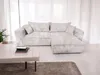 A sectional sofa is shown in a bright, minimalist living room setting. Produktbild-Vorschau