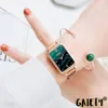 A woman's hand wearing a watch and bracelet. Produktbild-Vorschau