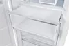 Close-up interior view of an empty white refrigerator or freezer, showing transparent drawers and shelves. Produktbild-Vorschau