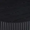 A close-up view of a black round table with a slatted base. Produktbild-Vorschau