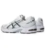 A pair of white Asics Gel-1130 sneakers with black accents, shown from a side-rear angle against a white background. Produktbild-Vorschau
