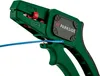 A close-up shot of a green wire stripper tool with a blue wire inserted. Produktbild-Vorschau