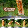 A salmon fillet being cooked on a wooden board over a fire, with instructional images below. Produktbild-Vorschau