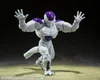 A Dragon Ball Z action figure of Frieza in his full power form, posed dynamically on a sandy surface with a dark background. Produktbild-Vorschau