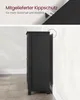 A black cabinet is shown from the side, placed against a white wall. The top part of the image shows a close-up of a safety bracket with German text indicating it's an anti-tip device for increased safety and stability. Produktbild-Vorschau