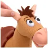 A close-up of a stuffed horse toy, with a hand adjusting its ear. Podgląd zdjęcia produktu