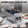 A commercial gas stove with two burners is shown in a kitchen setting, with pots on the burners and some food items in the background. Anteprima dell’immagine prodotto