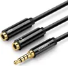 A close-up shot of a black audio cable with gold connectors. Anteprima dell’immagine prodotto
