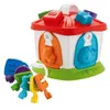 A toy house with shape sorter blocks and keys on a white background. Produktbild-Vorschau