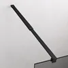 A black shower screen arm attached to a wall and extending over a glass shower panel. Produktbild-Vorschau