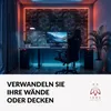 A modern gaming or home office setup with a desk, computer, chair, and decorative wall panels. Produktbild-Vorschau