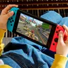 Nintendo Switch, Farbe: Neon-Rot/Neon-Blau, Speicher: 32 GB Produktbild-Vorschau 16