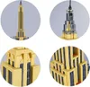 A collage of four close-up images of a Lego-style model of the Empire State Building. Voir les images du produit