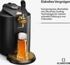 A black and gold beer dispenser with a glass of beer being poured. Produktbild-Vorschau